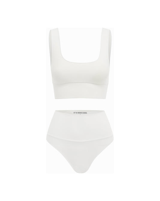 Studio image of the Contour Crop Top in White, featuring its square scoop neck silhouette.